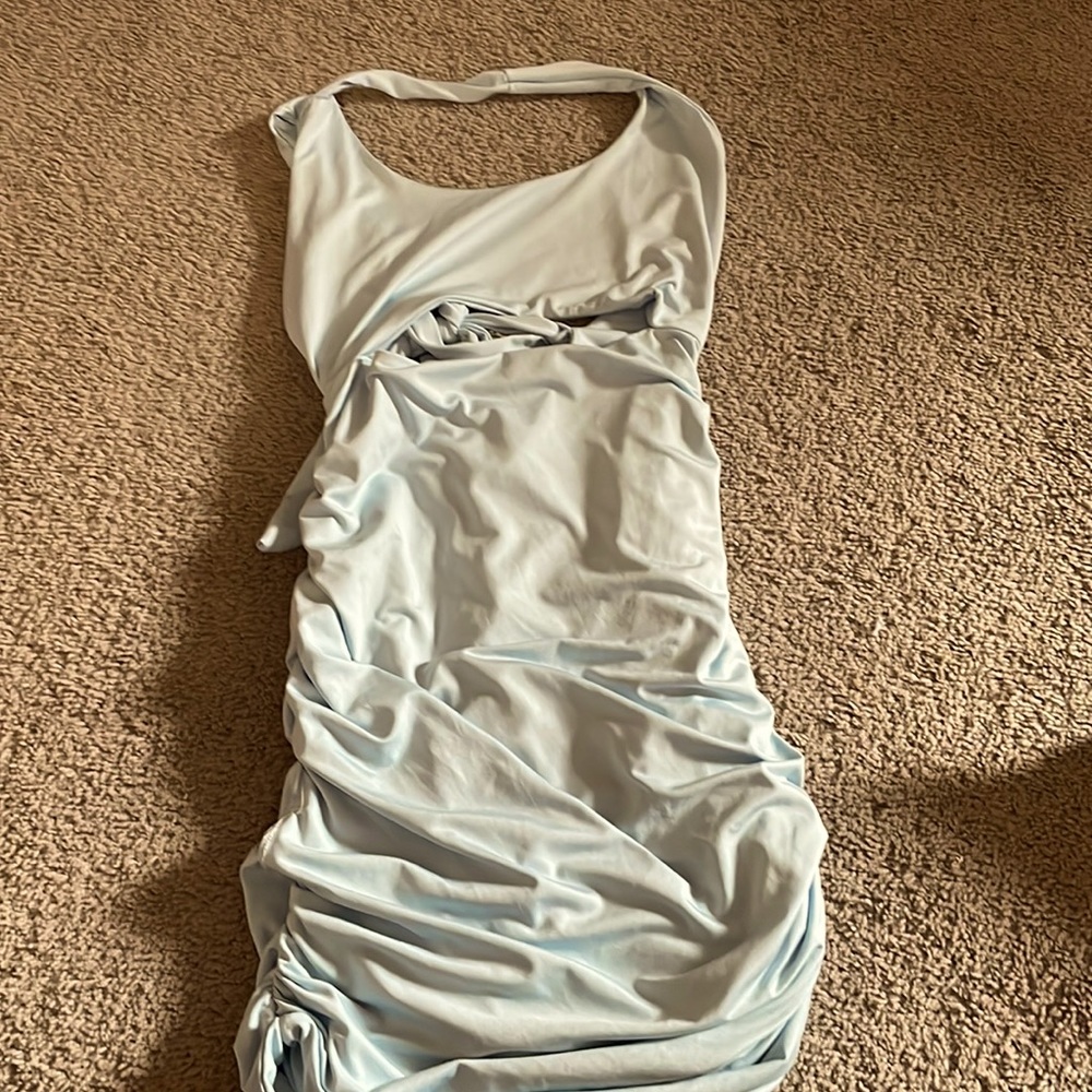 Halter mini dress in baby blue with opening in front right below chest